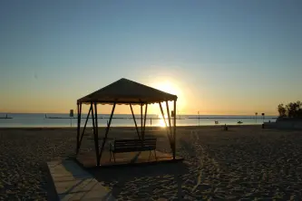 Blick auf den Strand bei Sonnenuntergang vom Camping Riccardo in Igea Marina