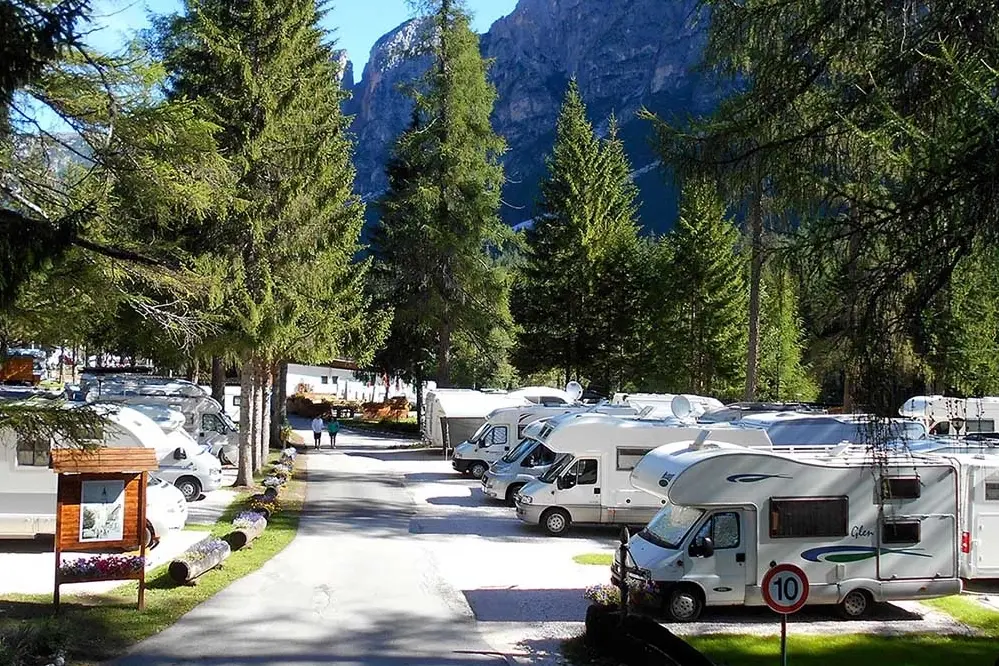 View of the International Olympia campsite surrounded by greenery