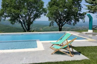 view from the hill of the Luna del Monte campsite over the Umbrian countryside at Monte Santa Maria Tiberina