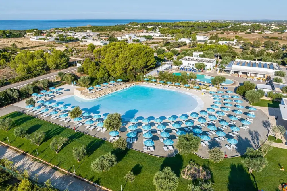 panoramic view of the swimming pool, the camping Porto Cesareo and the coast of Salento in Puglia