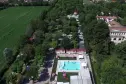 overview of the swimming pool, bungalows and pitches of Camping Serenissima in Malcontenta in Veneto