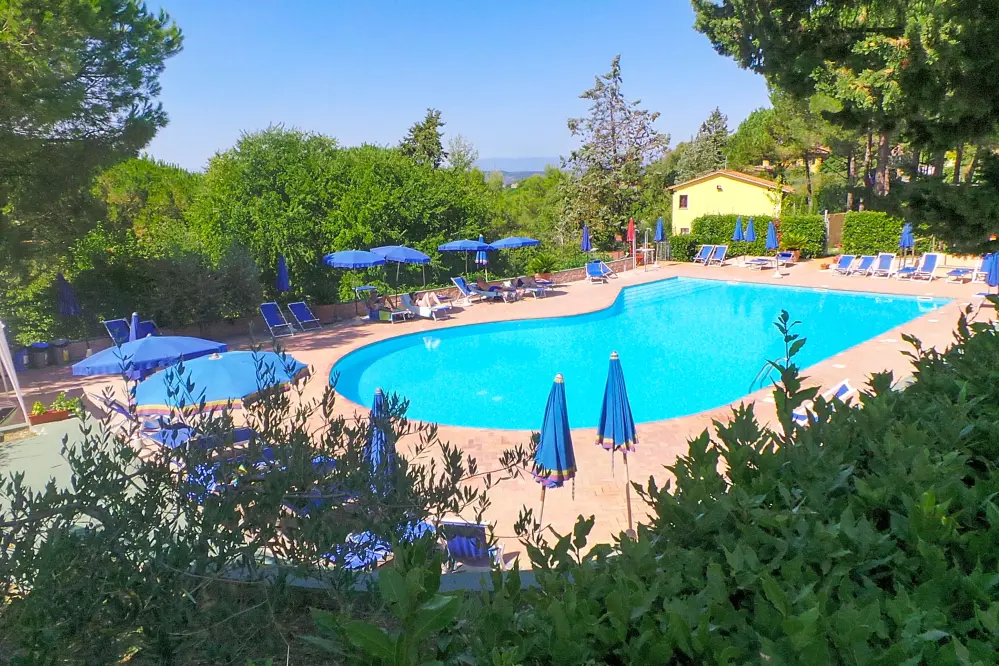 swimming pool of the camping toscana village in the Arno valley