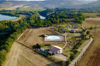 view of Capitello Camping on the banks of the Tiber River in Umbria