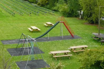 View of the Park and rows of apple trees at The Apple Camping & Caravan Park in Ireland
