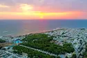 panoramic view at sunset on the beach and on the Camping Village Pineta al Mare in Salento in Puglia