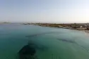 panoramisch uitzicht op de Siciliaanse zee en de camping Internazionale La Playa voor het Isola delle Femmine